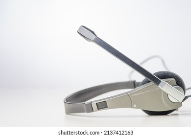 Modern Headphones Isolated On White Background. Close-up. One Object. Minimalism. There Are No People In The Photo. Music, Radio, Speaker, New Modern Technologies.