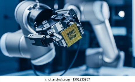 Modern High Tech Authentic Robot Arm Holding Contemporary Super Computer Processor. Industrial Robotic Manipulator End Effector Holding CPU Chip - Shutterstock ID 1501235957