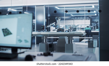 Modern High Tech Robotic Arm Picking Up and Moving a Microchip. Robot Hand Working at a Research and Development Factory with Server Racks in the Background. - Shutterstock ID 2242349343