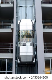 Modern High-speed Metal And Glass Passenger Elevator In An Office Building.