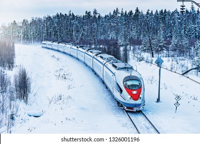 Modern high-speed train approaches to the station.