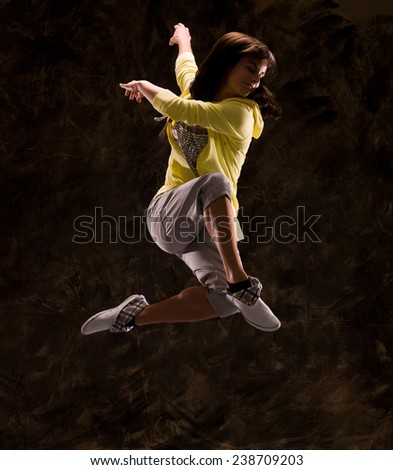 Modern hip-hop style teenage girl jumping Stock photo © 