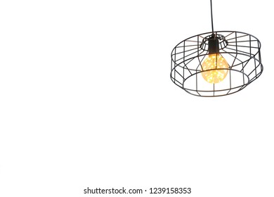 Modern Hipster Caged Ceiling Light Isolated On White Background, Copy Space. Realistic Black Fixture Of Lamp On White Wall. Aluminum Iron Decorative Lamp Hanging From Ceiling. Vintage Lighting Decor.