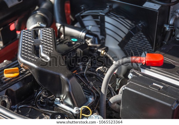 Modern hi-tech engine or motor of\
industrial loader or combine vehicle or small tractor, close\
up