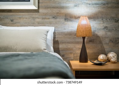 Modern Home Interior With Bedroom Setting Including Bedside Table With Lamp.