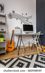 Modern Home Office With Small Desk, Crystal Chair, Music Wall Decor And Pattern Carpet