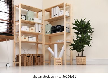 Modern home workplace with wooden storage. Idea for interior design