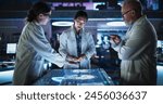 Modern Hospital Medical Cancer Research Center: Diverse Scientists Gathered Around Interactive Touch Screen Table With CT Scans Of Brain On Display. Three Doctors Discussing Brain Tumor Treatment.