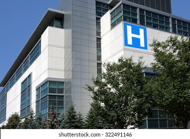 Modern Hospital Style Building Surrounded By Trees