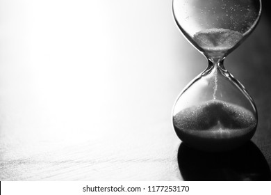 Modern Hourglass With Bright Background For Copy Space. Hourglass Time Passing Concept For Business Deadline, Urgency And Running Out Of Time.