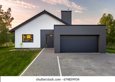 Modern House With Garage And Green Lawn, Exterior View