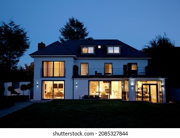 Modern House Illuminated At Night