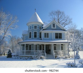modern house trimmed in snow
