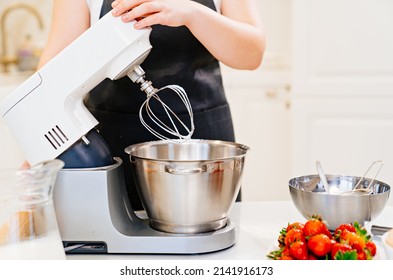 Modern Immersion Mixer In The Kitchen For Baking And Desserts. Professional Equipment For Home And Professional Confectioners And Bakers. Family Business. Cakes To Order.