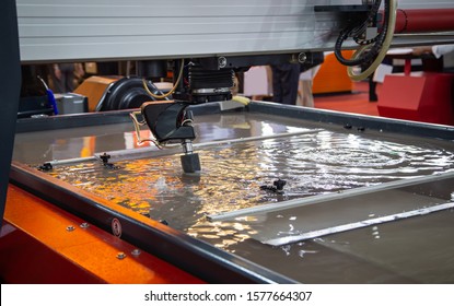 Modern Industry CNC Abrasive Water Jet Cutting Machine Using High Pressure Water Jet To Cut Metal. Industrial Metalwork Machinery.