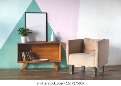 Modern interior with armchair and mockup place for your design. Table and book shelf. Colorful wall. Plant in a cap. 