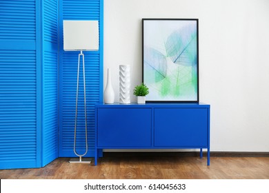 Modern Interior Design With Furniture And Blue Wooden Screen