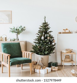 Modern Interior Design Living Room With Christmas / New Year Decorations, Toys, Gifts, Fir Tree. Winter Holidays Composition.