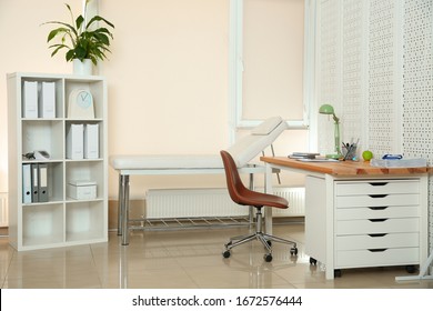 Modern Interior Of Doctor's Office With Workplace