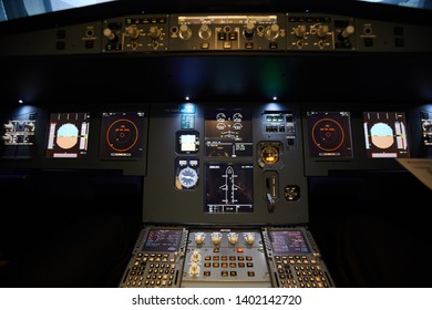 Modern Interior Of Jet Aircraft Cockpit With Small Monitors For Managing Flight Control System, Copy Space