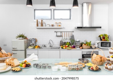 Modern interior kitchen background with baking ingredients and fruits ready for cooking and eating. - Powered by Shutterstock