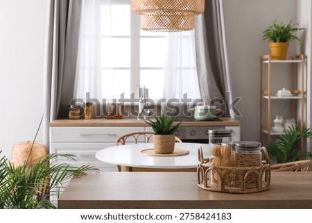 Modern interior of kitchen with dining table