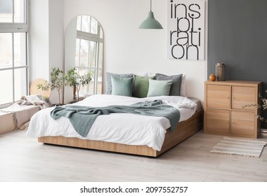Modern interior of light bedroom with mirror - Shutterstock ID 2097552757