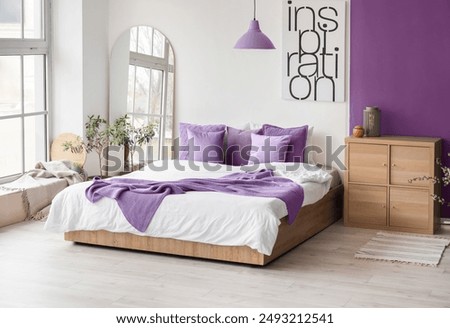 Similar – Image, Stock Photo Modern bedroom with purple accents and city view