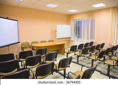 Modern Interior Of A Small Conference Hall In Pink Tones