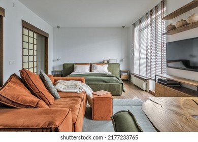 Modern Japandi interior design appartment in earth tones, natural textures with wooden solid oak furniture and sliding Japanese wood doors. Japandi concept - Shutterstock ID 2177233765
