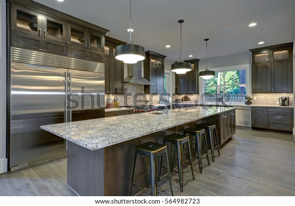 Brown Kitchen Island Cabinet modern kitchen with brown kitchen cabinets oversized kitchen island with bar stools granite countertops