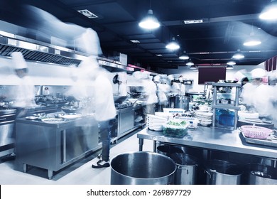 Modern Kitchen And Chefs In Hotel 