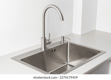Modern kitchen faucet and sink - Shutterstock ID 2274179459