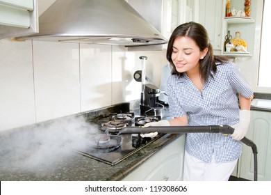 Modern Kitchen - Happy Woman Steam Cleaning