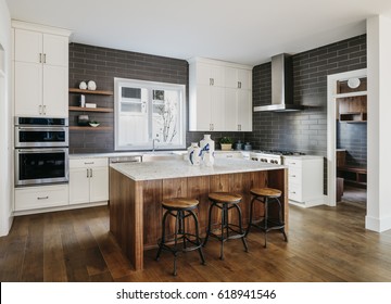 Modern kitchen with the hardwood floors. Portland, Oregon
