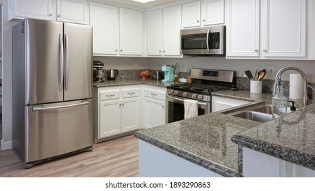 Modern Kitchen Interior With Dark Granite Counters And Stainless Steel Appliances, Single Family Home In California                                 