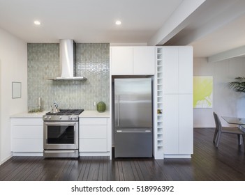 Modern kitchen interior. Design concept with new stainless steel appliances.