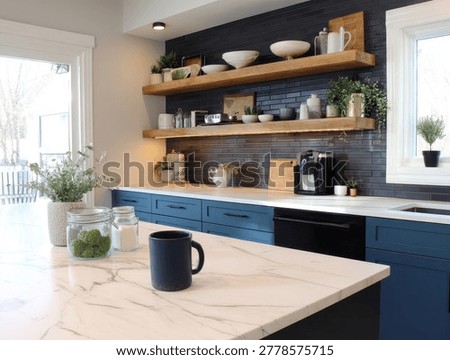Modern kitchen interior features navy blue cabinets, marble countertops, and rustic floating shelves in bright natural light. Perfect for home renovation and interior design promotion.