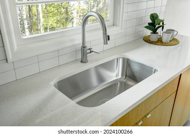 Modern kitchen interior with a window - Shutterstock ID 2024100266