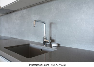 Modern Kitchen Metal Faucet And Ceramic Kitchen Sink.