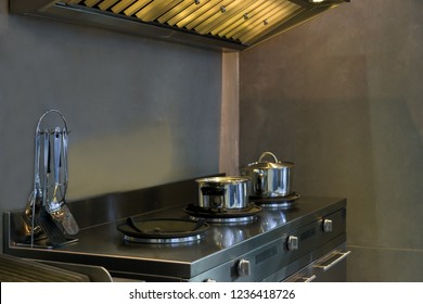 Modern kitchen with stainless steal pot on the counter and stoves interior furniture contemporary in house. 