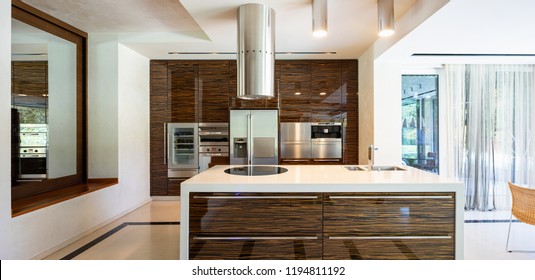 Modern Kitchen In Wood And Marble With Island. Nobody Inside