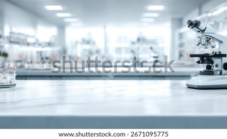 Modern lab workspace with microscope on marble countertop