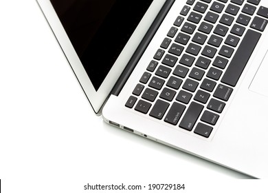 Modern laptop computer on white - Powered by Shutterstock