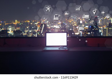 Modern Laptop With Internet Of Things (IOT) Objects Icon Connecting Together Coming Out Monitor, Internet Networking Concept, Connect Global Wireless Devices With Each Other.