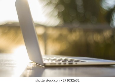 Modern Laptop On The Beach, Shallow Depth Of Field