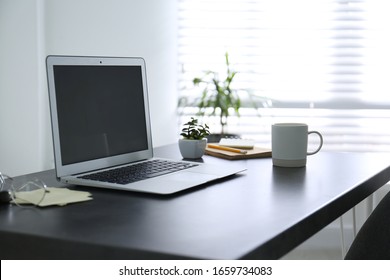 Modern Laptop On Office Table. Stylish Workplace