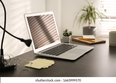 Modern Laptop On Office Table. Stylish Workplace