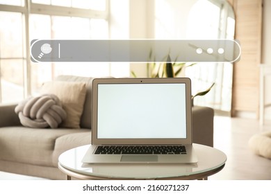 Modern laptop on table in light room. Concept of search