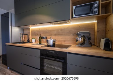 Modern large luxury dark gray kitchen furniture - Powered by Shutterstock